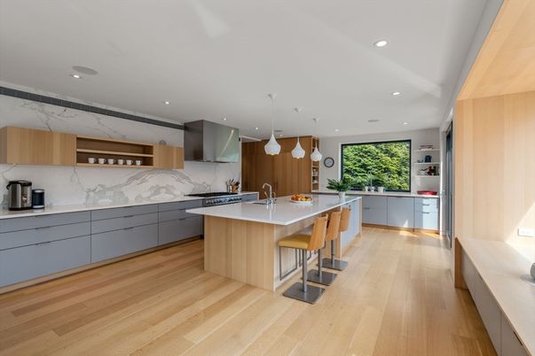 Interior, Kitchen, Marble Walls, Pendant Lights, Recessed Lighting, Stainless Steel Appliances, Wood Texture Flooring