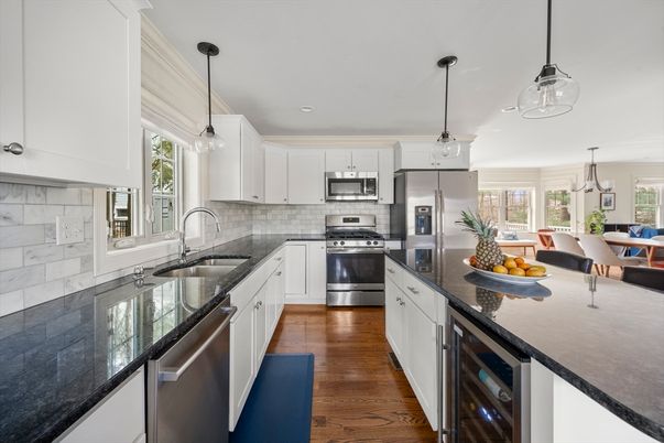 Dining room, Interior, Kitchen, Pendant Lights, Recessed Lighting, Stainless Steel Appliances, Wood Texture Flooring