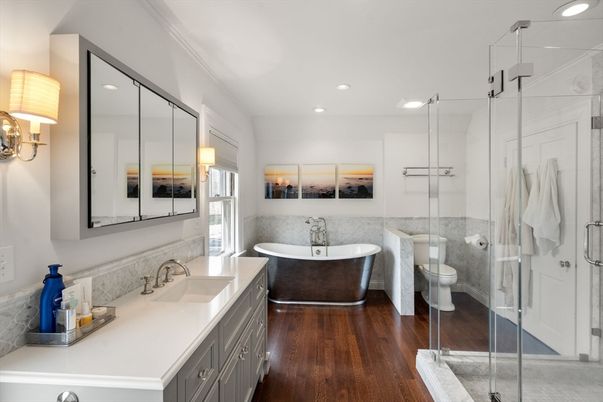 Bathroom, Dual Sink Vanities, Free Standing Baths, Glass Shower, Interior, Recessed Lighting, Wood Texture Flooring