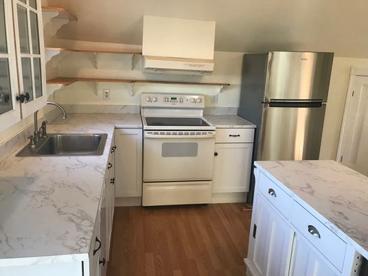 Interior, Kitchen, Marble Walls, Stainless Steel Appliances, Wood Texture Flooring