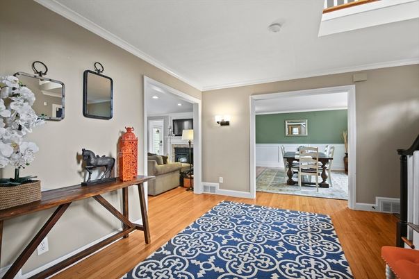 Dining room, Fireplace, Interior, Living room, Recessed Lighting, Wood Texture Flooring