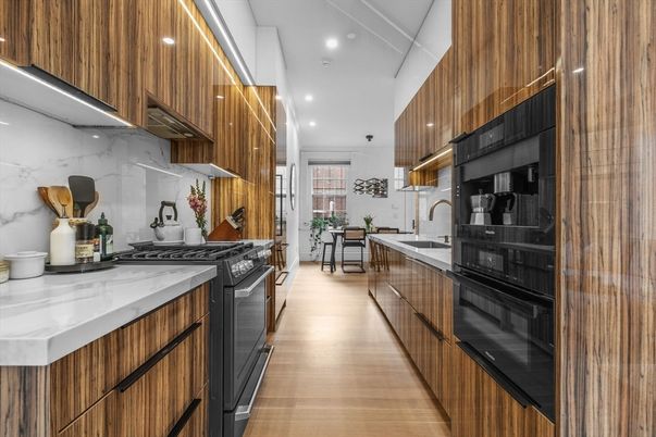 Interior, Kitchen, Marble Walls, Recessed Lighting, Stainless Steel Appliances, Wood Texture Flooring