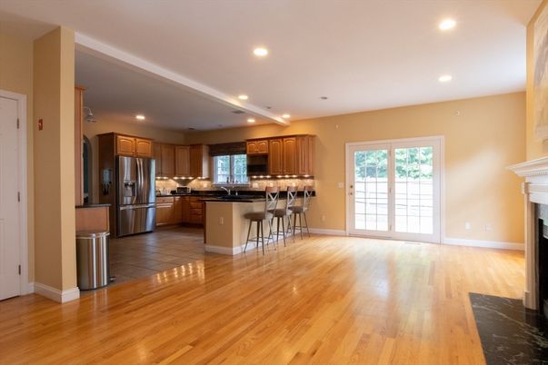 Fireplace, Interior, Kitchen, Recessed Lighting, Stainless Steel Appliances, Wood Texture Flooring