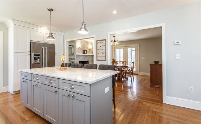 Dining room, Fireplace, Interior, Kitchen, Pendant Lights, Recessed Lighting, Stainless Steel Appliances, Wood Texture Flooring