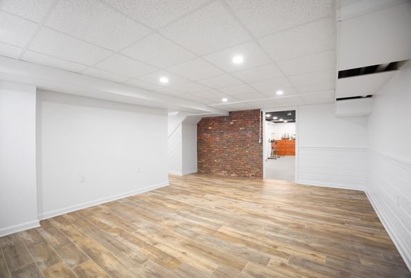Empty room, Interior, Recessed Lighting, Stone Walls, Wood Texture Flooring