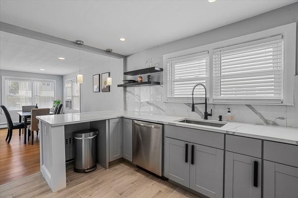 Dining room, Interior, Kitchen, Pendant Lights, Recessed Lighting, Stainless Steel Appliances, Wood Texture Flooring