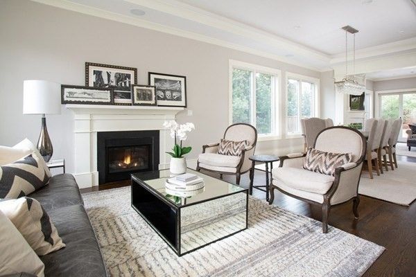 Chandelier, Dining room, Fireplace, Interior, Living room, Pendant Lights, Recessed Lighting, Wood Texture Flooring