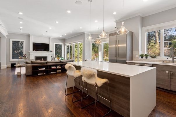 Fireplace, Interior, Kitchen, Living room, Pendant Lights, Recessed Lighting, Stainless Steel Appliances, Wood Texture Flooring