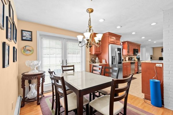 Chandelier, Dining room, Interior, Kitchen, Recessed Lighting, Stainless Steel Appliances, Wood Texture Flooring