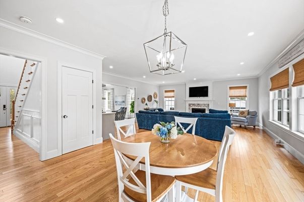 Dining room, Fireplace, Interior, Living room, Pendant Lights, Recessed Lighting, Wood Texture Flooring