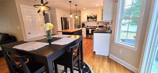Dining room, Interior, Kitchen, Pendant Lights, Recessed Lighting, Stainless Steel Appliances, Wood Texture Flooring