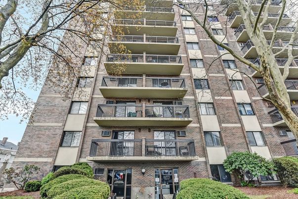 Exterior, Facade, Brick Facade, Condo Building