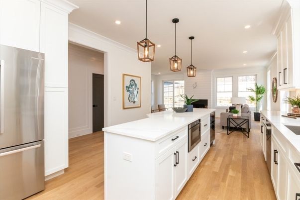Dining room, Fireplace, Interior, Kitchen, Living room, Pendant Lights, Recessed Lighting, Stainless Steel Appliances, Wood Texture Flooring