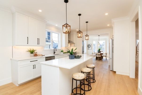 Dining room, Interior, Kitchen, Pendant Lights, Recessed Lighting, Stainless Steel Appliances, Wood Texture Flooring