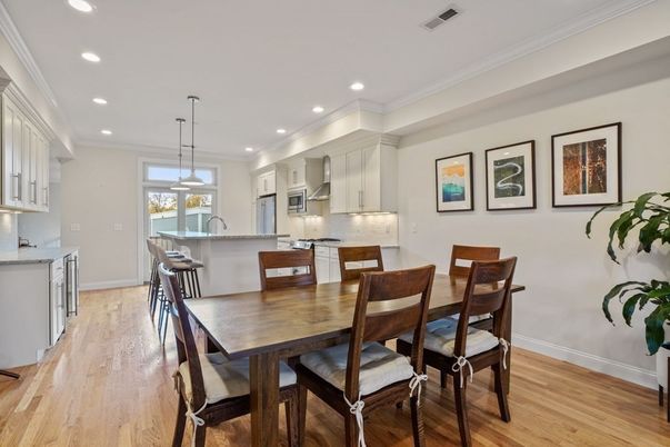 Dining room, Interior, Kitchen, Pendant Lights, Recessed Lighting, Stainless Steel Appliances, Wood Texture Flooring
