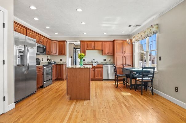 Chandelier, Dining room, Interior, Kitchen, Pendant Lights, Recessed Lighting, Stainless Steel Appliances, Wood Texture Flooring