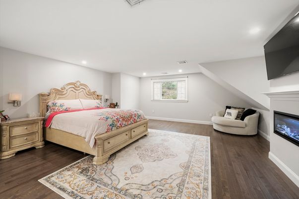 Bedroom, Fireplace, Interior, Recessed Lighting, Wood Texture Flooring