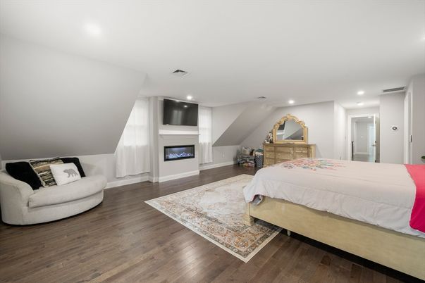 Bedroom, Fireplace, Interior, Recessed Lighting, Wood Texture Flooring