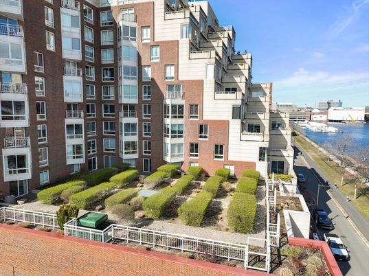 Exterior, Facade, Water, Condo Building