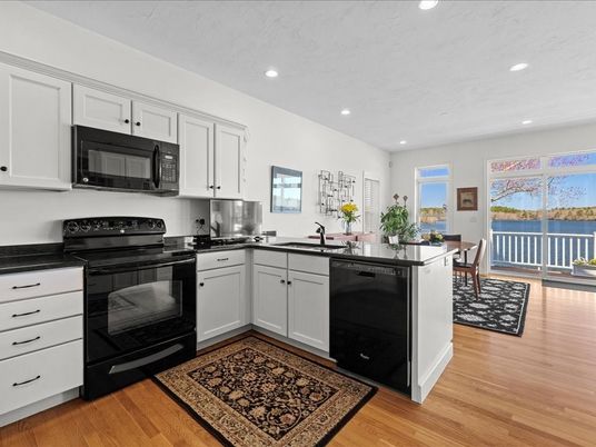 Dining room, Interior, Kitchen, Recessed Lighting, Stainless Steel Appliances, Wood Texture Flooring