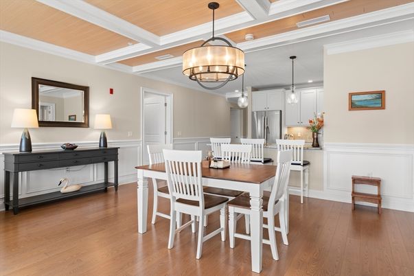 Chandelier, Dining room, Interior, Kitchen, Pendant Lights, Stainless Steel Appliances, Wood Texture Flooring