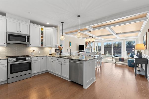 Dining room, Interior, Kitchen, Living room, Pendant Lights, Recessed Lighting, Stainless Steel Appliances, Wood Texture Flooring