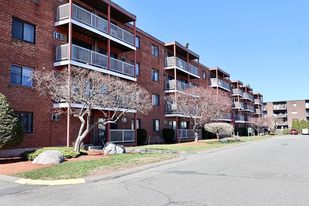 Exterior, Facade, Brick Facade, Condo Building