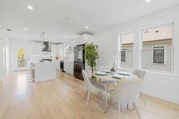 Dining room, Interior, Kitchen, Pendant Lights, Recessed Lighting, Stainless Steel Appliances, Wood Texture Flooring