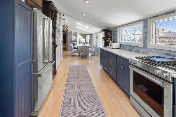 Dining room, Interior, Kitchen, Living room, Recessed Lighting, Stainless Steel Appliances, Wood Texture Flooring