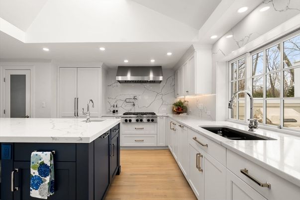 Interior, Kitchen, Marble Walls, Recessed Lighting, Stainless Steel Appliances, Wood Texture Flooring