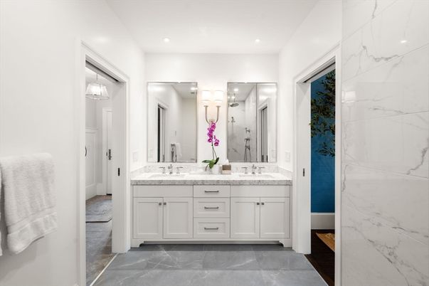 Bathroom, Dual Sink Vanities, Interior, Marble, Marble Walls, Pendant Lights, Recessed Lighting