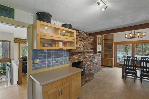 Dining room, Fireplace, Interior, Stone Walls, Wood Texture Flooring