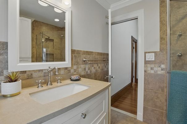 Bathroom, Dual Sink Vanities, Glass Shower, Interior, Recessed Lighting, Wood Texture Flooring