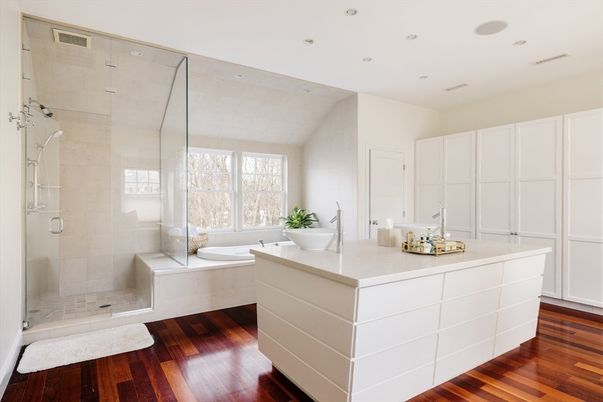 Bathroom, Dual Sink Vanities, Glass Shower, Interior, Recessed Lighting, Wood Texture Flooring