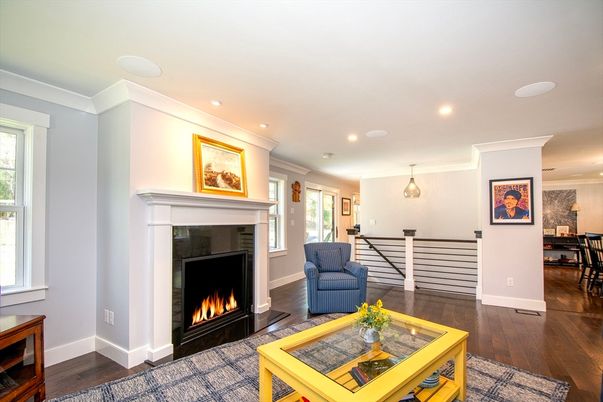 Dining room, Fireplace, Interior, Living room, Pendant Lights, Recessed Lighting, Wood Texture Flooring