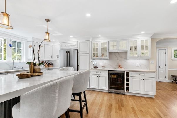 Interior, Kitchen, Marble Walls, Pendant Lights, Recessed Lighting, Stainless Steel Appliances, Wood Texture Flooring