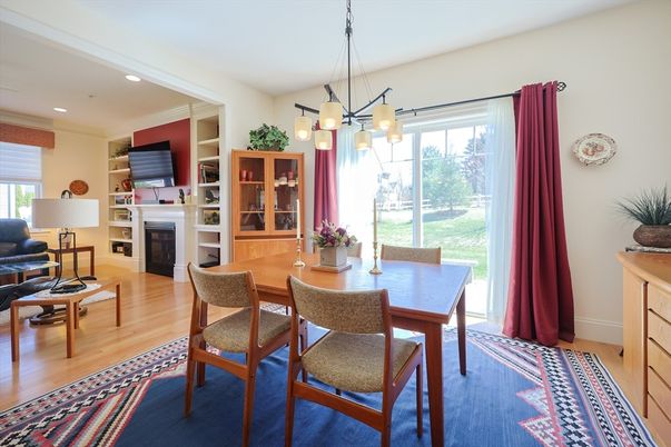 Dining room, Fireplace, Interior, Living room, Pendant Lights, Recessed Lighting, Wood Texture Flooring