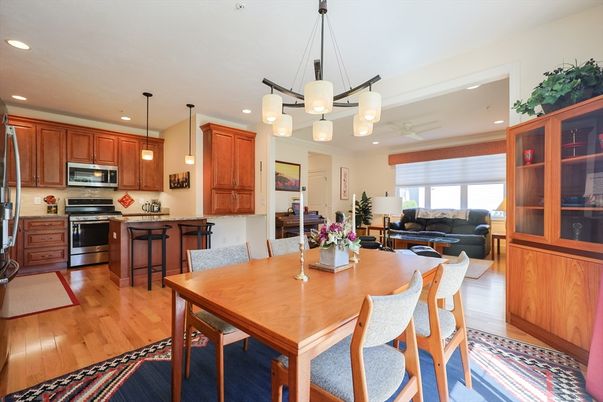 Dining room, Interior, Kitchen, Living room, Pendant Lights, Recessed Lighting, Stainless Steel Appliances, Wood Texture Flooring