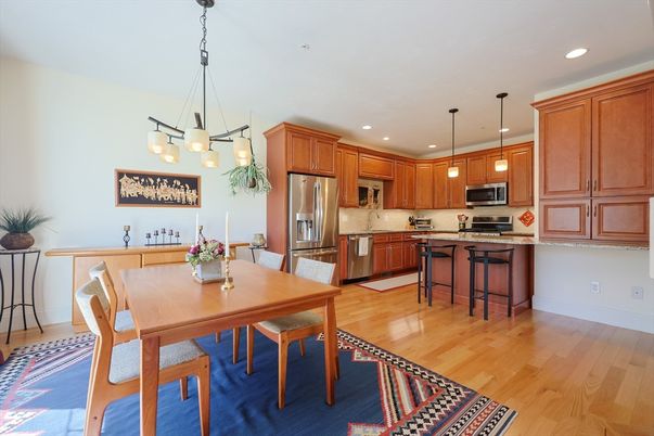 Dining room, Interior, Kitchen, Pendant Lights, Recessed Lighting, Stainless Steel Appliances, Wood Texture Flooring