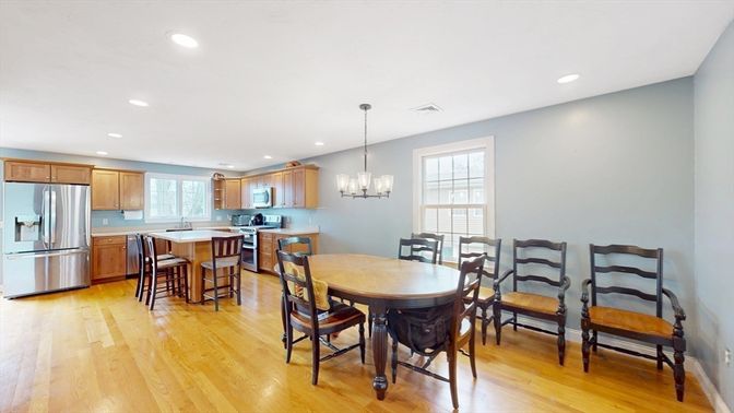 Chandelier, Dining room, Interior, Kitchen, Pendant Lights, Recessed Lighting, Stainless Steel Appliances, Wood Texture Flooring