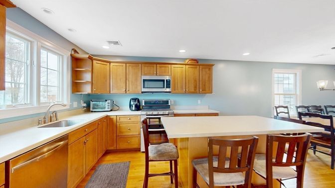 Dining room, Interior, Kitchen, Recessed Lighting, Stainless Steel Appliances, Wood Texture Flooring