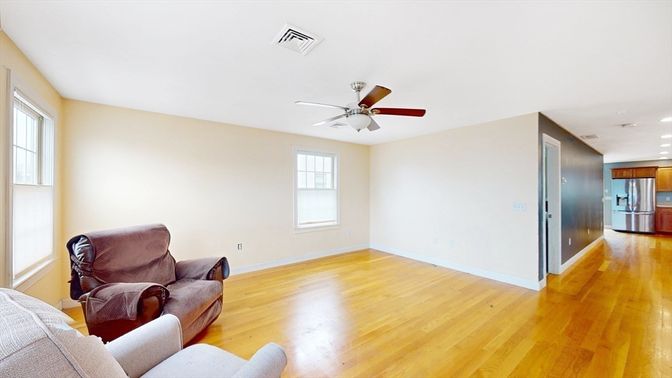 Empty room, Interior, Kitchen, Recessed Lighting, Stainless Steel Appliances, Wood Texture Flooring