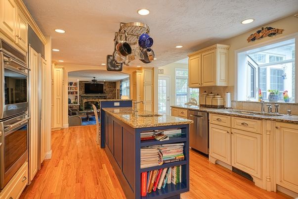 Dining room, Interior, Kitchen, Recessed Lighting, Stainless Steel Appliances, Stone Walls, Wood Texture Flooring