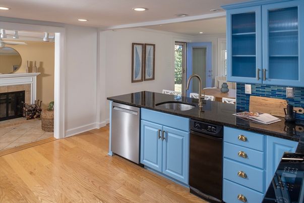 Fireplace, Interior, Kitchen, Recessed Lighting, Stainless Steel Appliances, Wood Texture Flooring