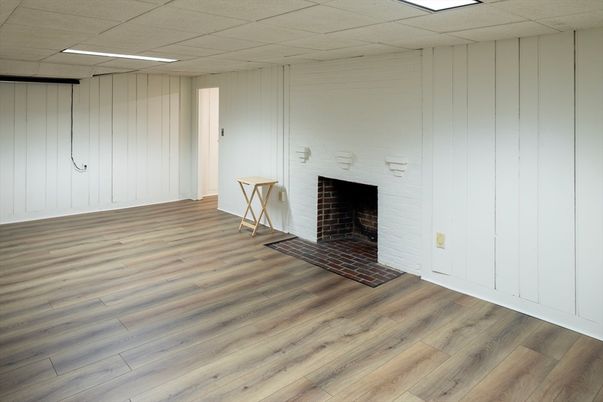 Empty room, Fireplace, Interior, Recessed Lighting, Wood Texture Flooring