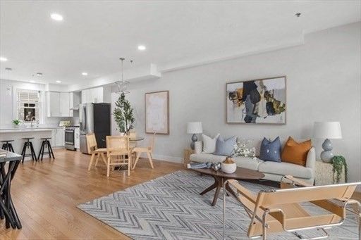 Chandelier, Dining room, Interior, Kitchen, Living room, Pendant Lights, Recessed Lighting, Stainless Steel Appliances, Wood Texture Flooring