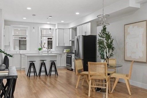 Dining room, Interior, Kitchen, Pendant Lights, Recessed Lighting, Stainless Steel Appliances, Wood Texture Flooring