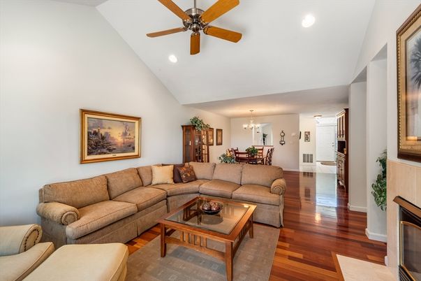 Chandelier, Dining room, Fireplace, Interior, Living room, Recessed Lighting, Wood Texture Flooring