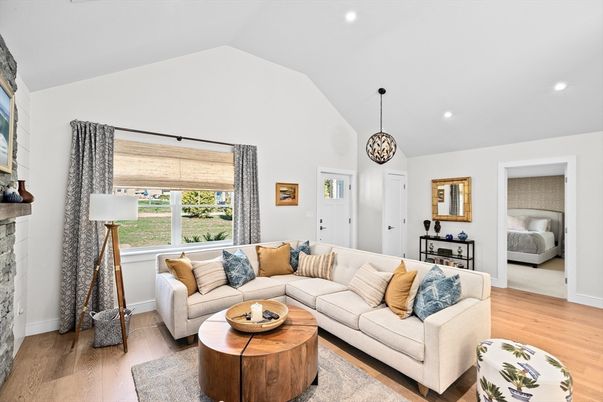 Bedroom, Fireplace, Interior, Living room, Pendant Lights, Recessed Lighting, Wood Texture Flooring