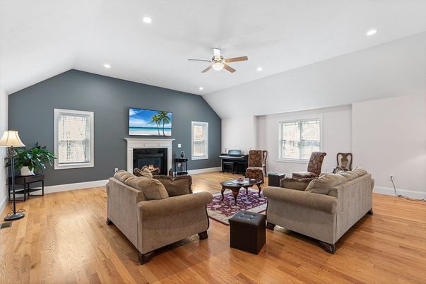 Fireplace, Interior, Living room, Piano, Recessed Lighting, Wood Texture Flooring
